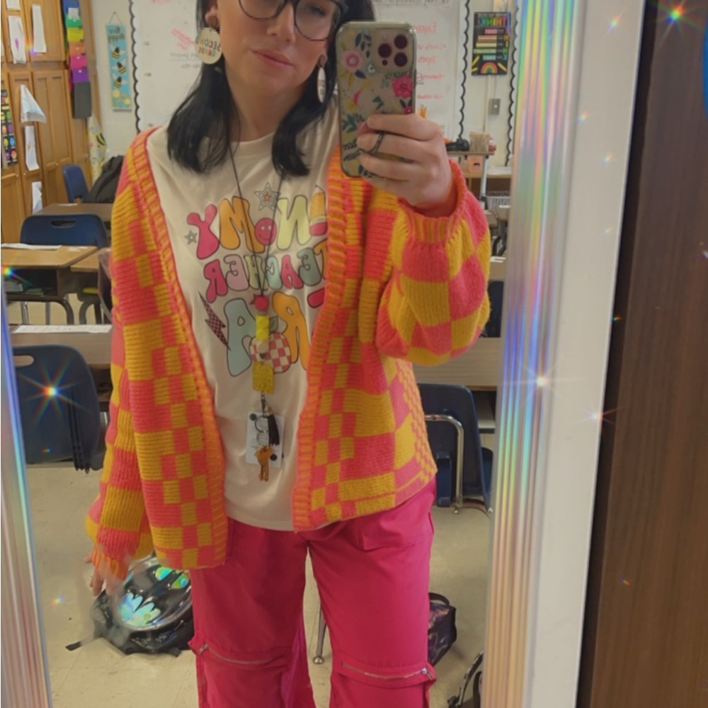 Orange and Pink sweater. Worn just a handful of times. Thick and comfy!